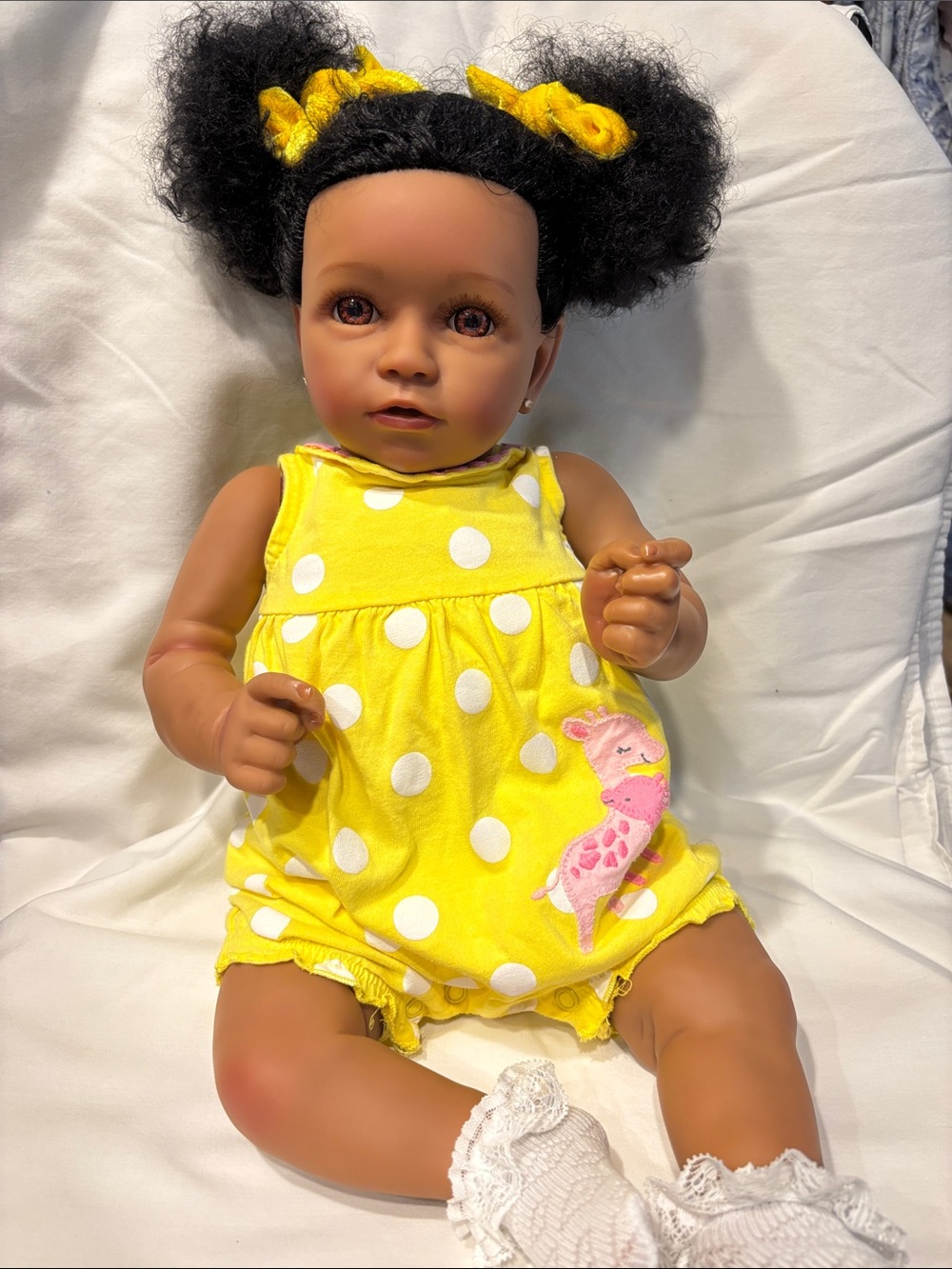 Reborn baby doll with Yellow Polka Dot Romper